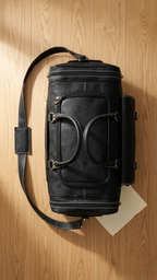 Top view of the black Ridgeway Cabin Duffel, showing the U-shaped main zipper, folded handles and zipped end compartments.