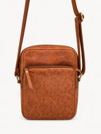 Bracken Mini Crossbody front detail showing the zip pocket and its long pull tab.