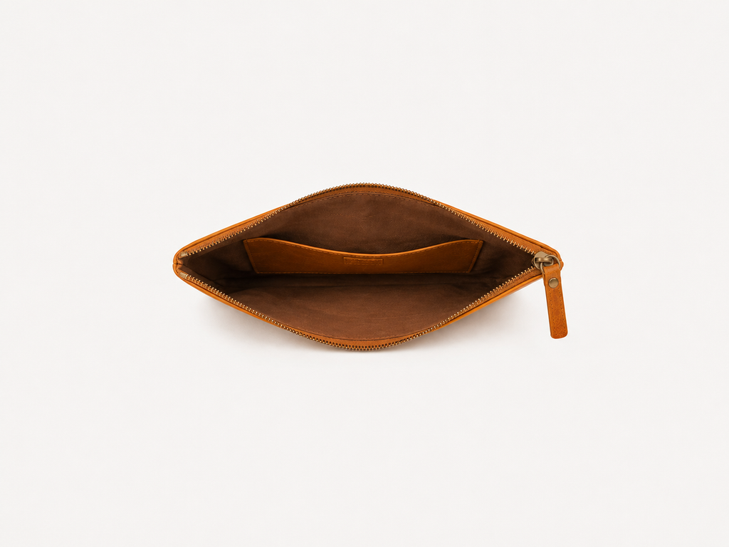 Twinleaf and Clay pouch opened to show the lined interior and a wide slip pocket.