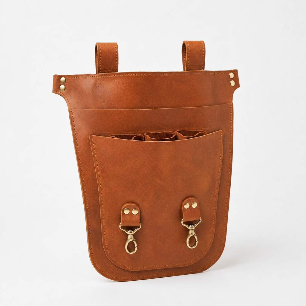 Benchside Tool Bag viewed at an angle, showing individual tool sleeves inside the front pocket.