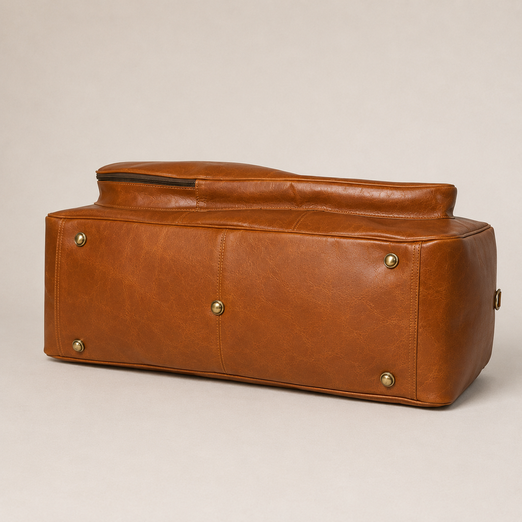 Base of the Courtside Tennis Duffel, showing five metal feet.