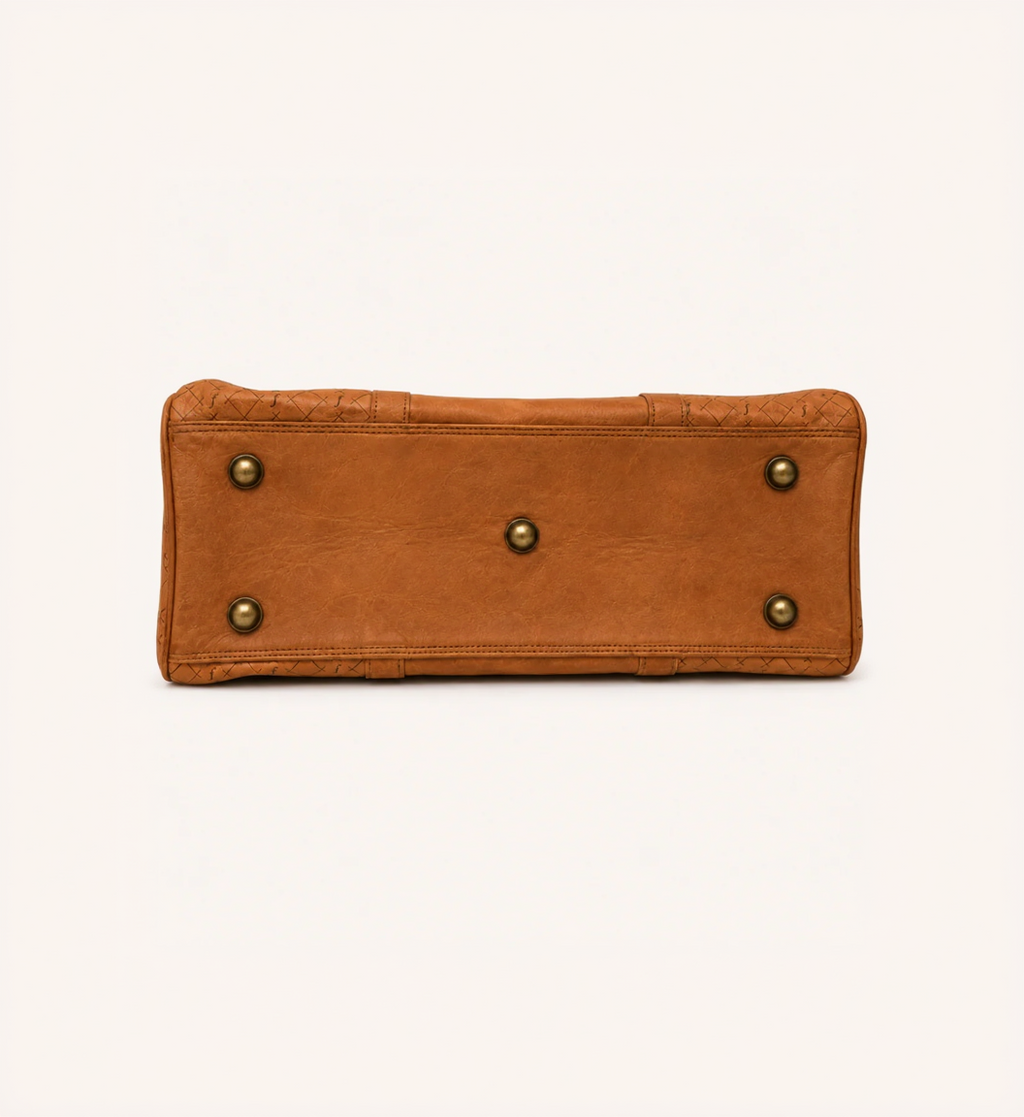 Ridgeline Weekender Duffel underside showing five metal feet.
