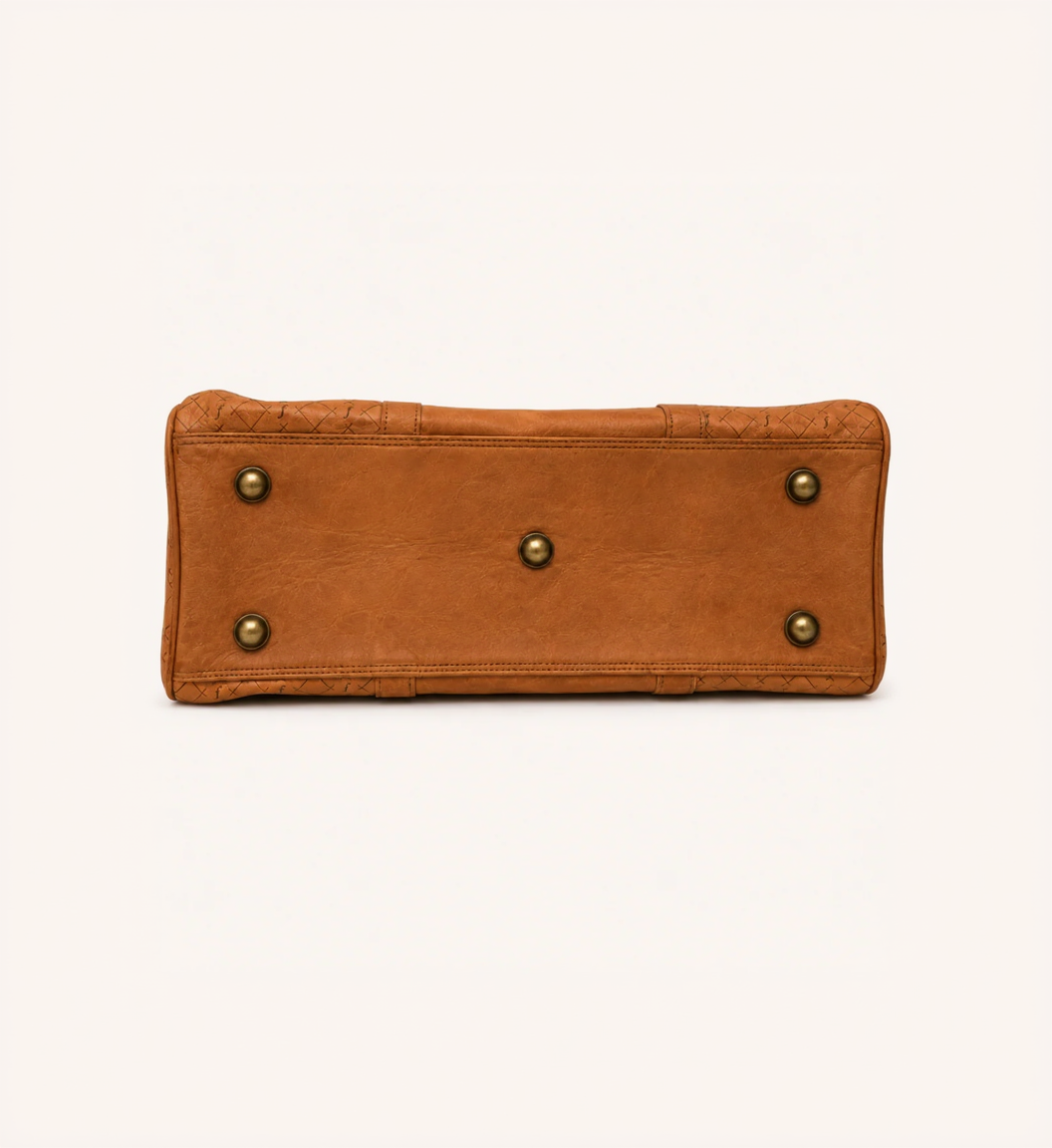 Ridgeline Weekender Duffel underside showing five metal feet.