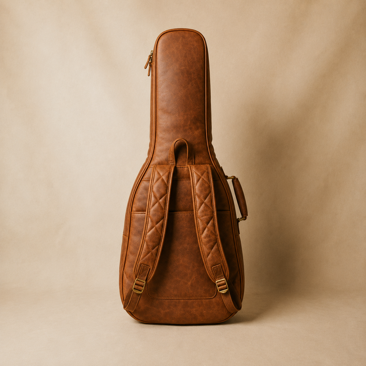 Rear view of the Stringwood Guitar Bag, showing two adjustable backpack straps, a hanging loop and side handle.