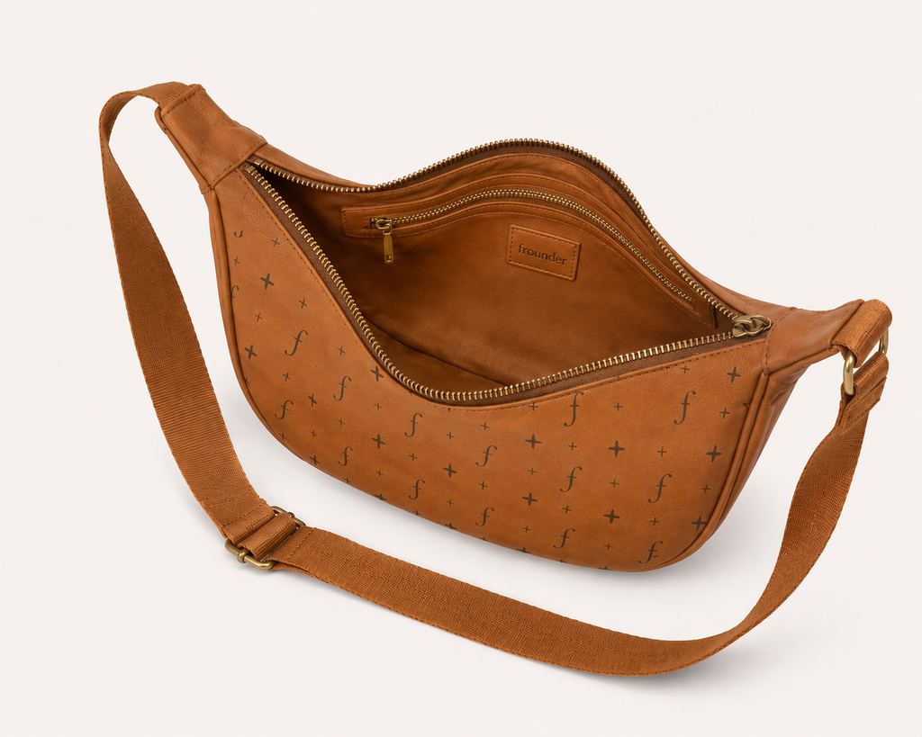 Fernway Sling opened to show the main compartment and zipped interior pocket.