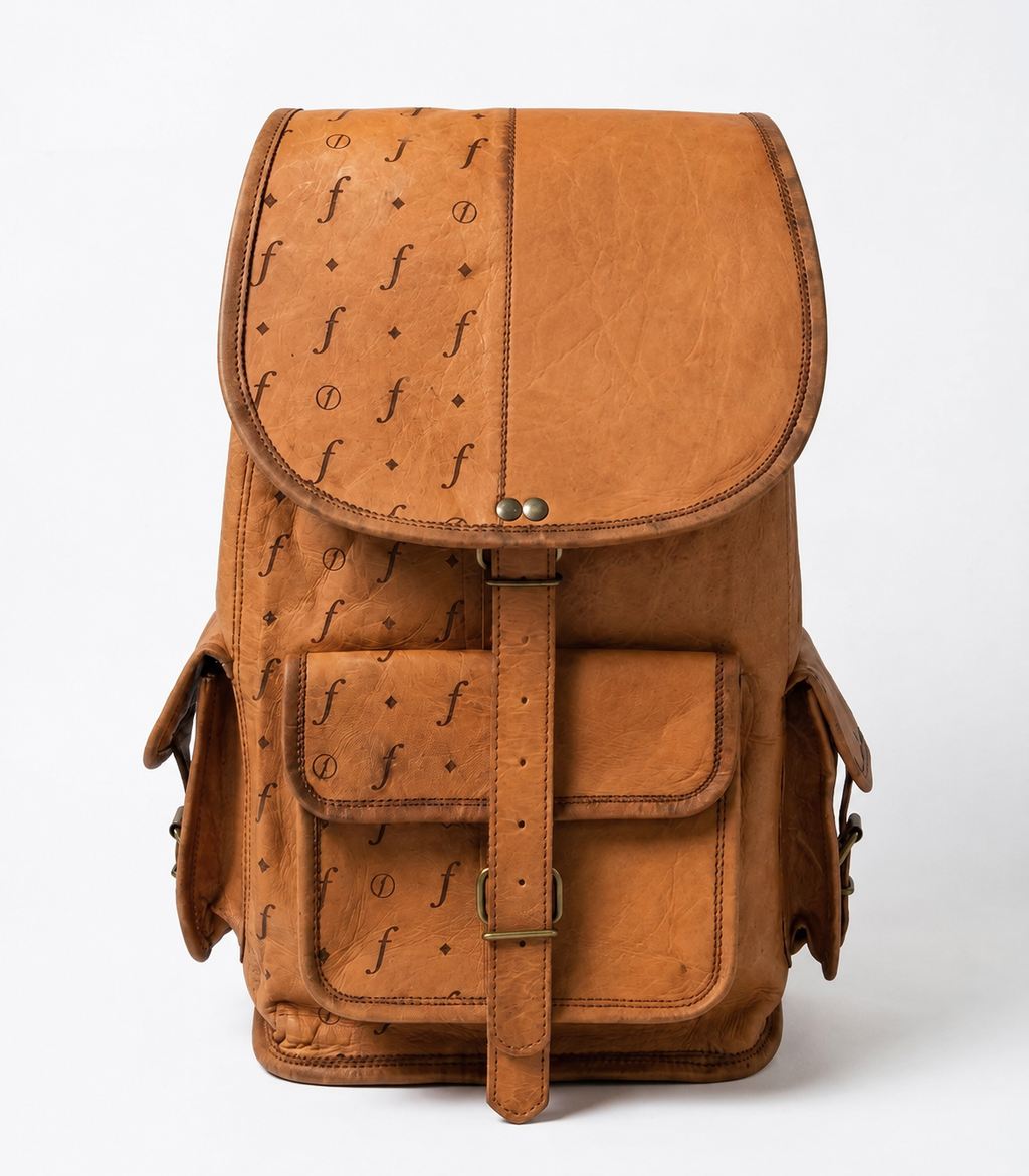 Roamwood backpack showing its rounded flap, front pocket and two side pockets.