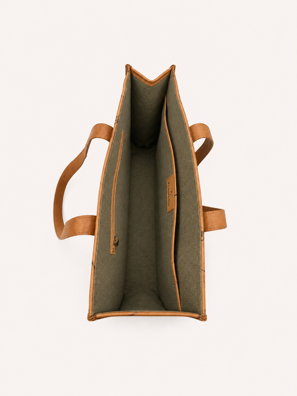Meadow open interior with a zip pocket on one side and a broad slip pocket on the other.