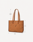 Meadow measurement graphic labels 15-inch width, 11-inch height and a 10-inch shoulder-handle drop.