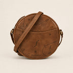 Glade front view: a circular profile, patterned surface and slip pocket across the front.