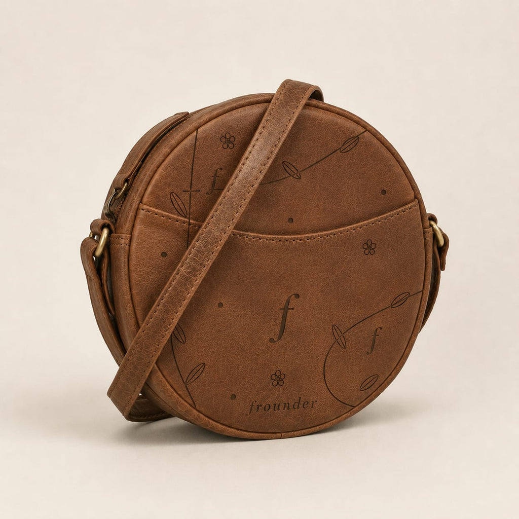 Glade angled view showing the front slip pocket, zip edge and side strap rings.