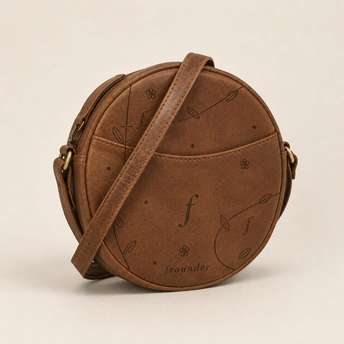 Glade angled view showing the front slip pocket, zip edge and side strap rings.