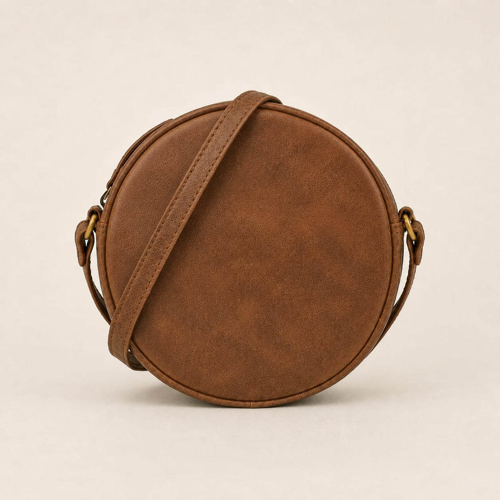 Glade rear view showing the plain circular back panel and narrow shoulder strap.