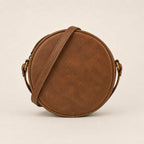 Glade rear view showing the plain circular back panel and narrow shoulder strap.