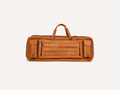 Fieldline carrying case showing twin handles, two buckled outer pockets and a large central zipped panel.