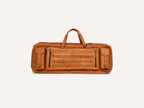 Fieldline carrying case showing twin handles, two buckled outer pockets and a large central zipped panel.