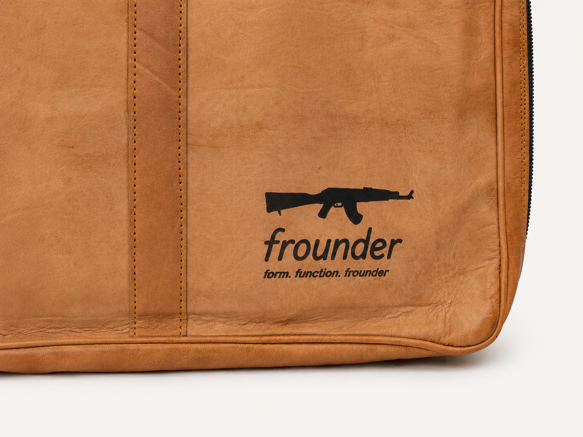 Close view of the Fieldline case exterior, showing stitching, surface texture and the original printed mark.