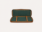 Fieldline case fully opened, showing the green lining and two internal retaining straps.